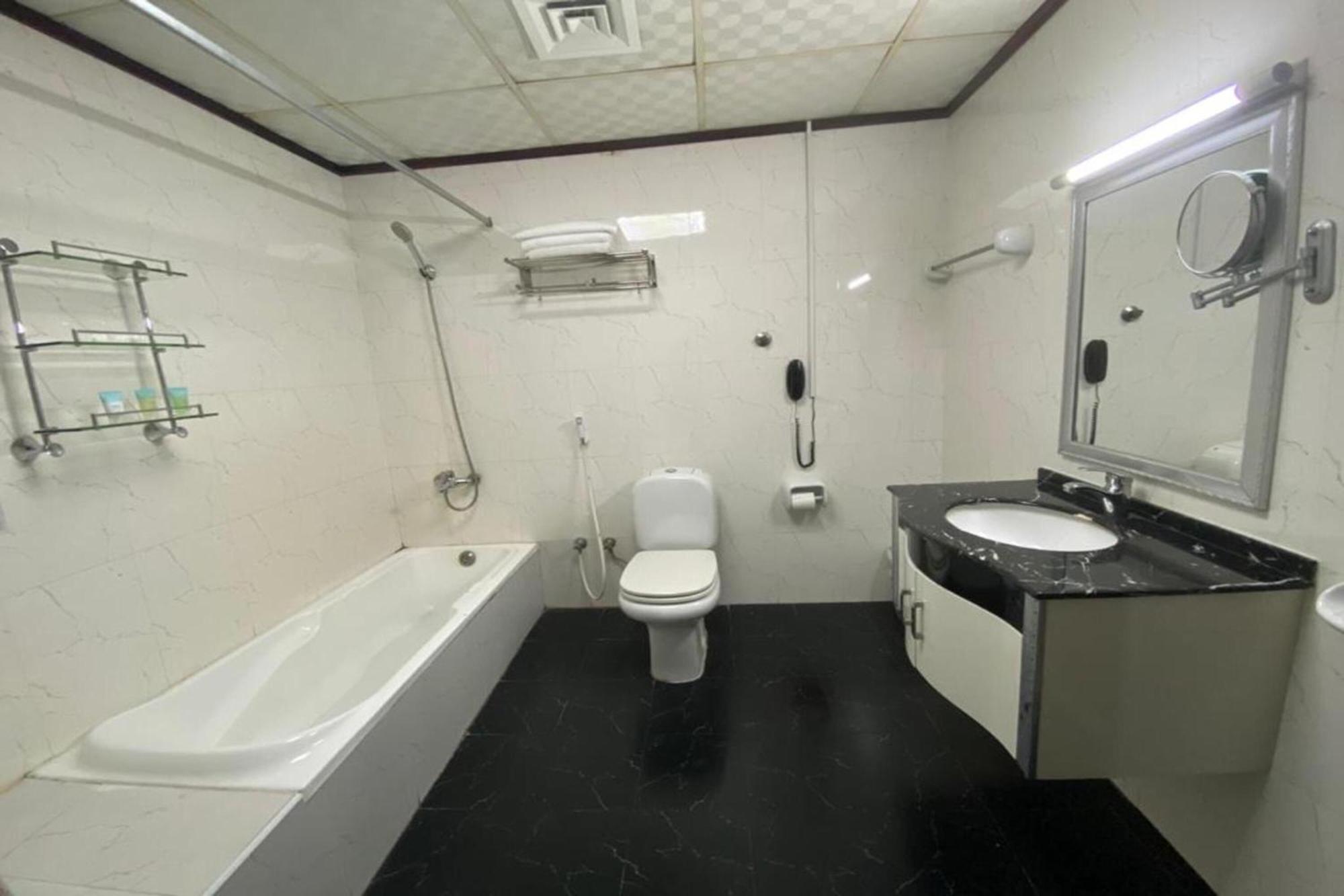 Grand Pj Hotel Ras al-Khaimah Rum bild